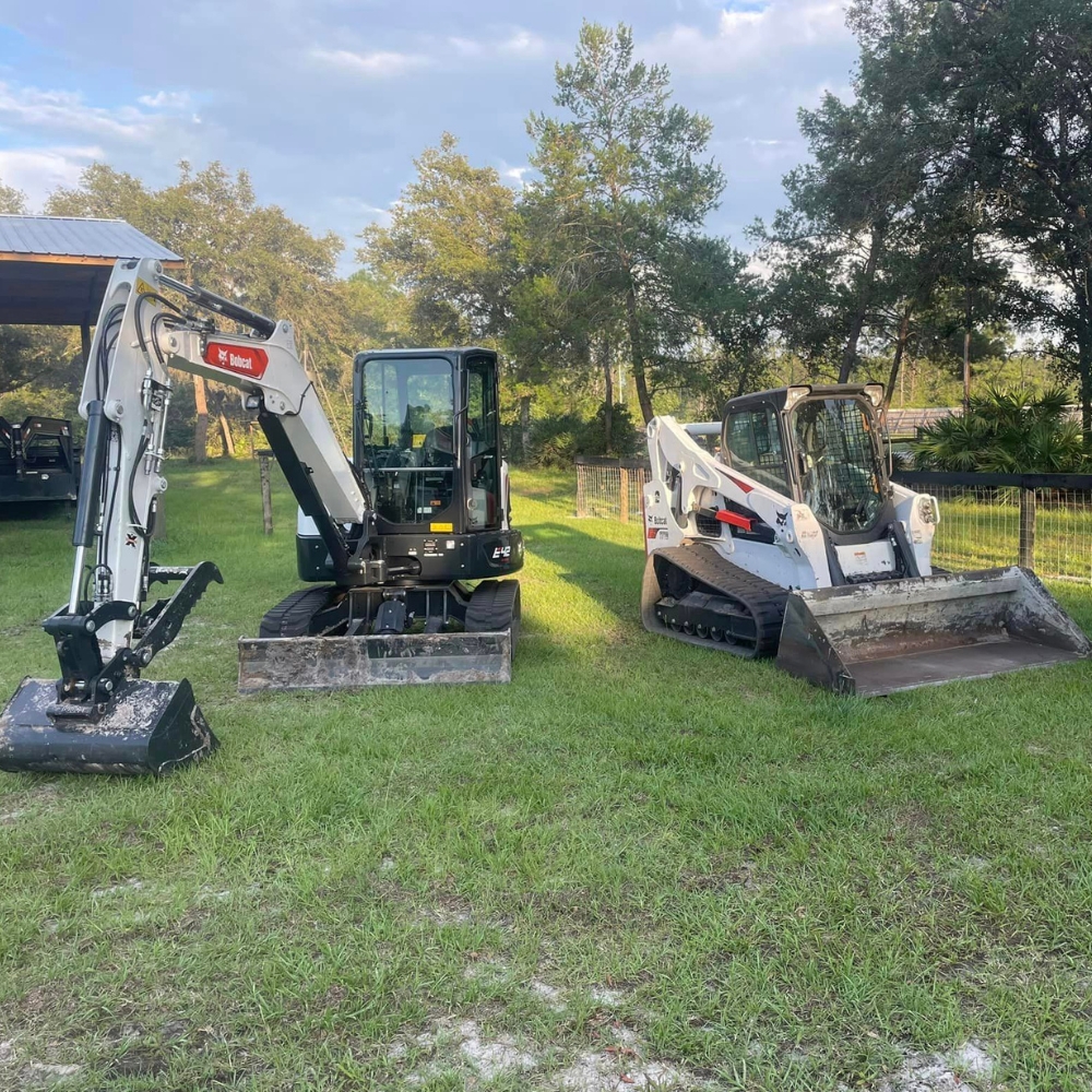 skid steer and excavator waiting to work on a project